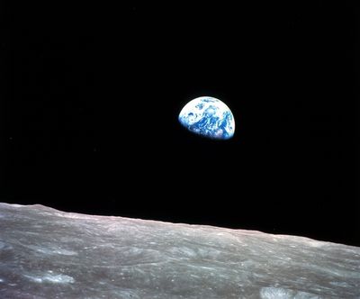 FILE - This Dec. 24, 1968, file photo made available by NASA shows the Earth behind the surface of the moon during the Apollo 8 mission. (William Anders/NASA via AP, File) ORG XMIT: NY972 (William Anders / AP)