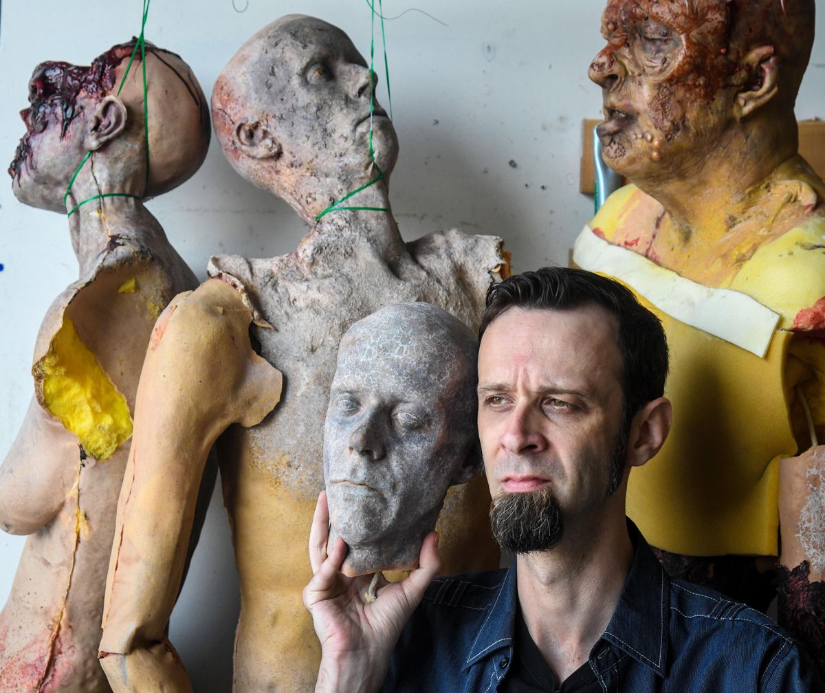 Z Nation actor Matt Davidson holds a molded likeness of his face, Thursday, May 30, 2019. (Dan Pelle / The Spokesman-Review)