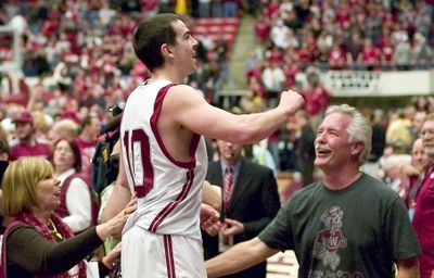 Taylor Rochestie soaks it all in after his 3-pointer lifted the Cougars over Arizona State in overtime.   (Associated Press / The Spokesman-Review)