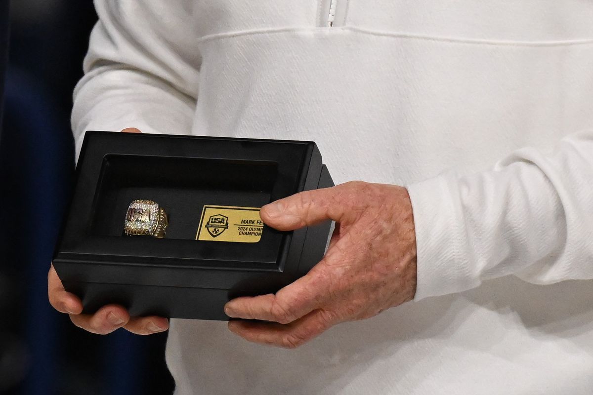 Gonzaga Bulldogs head coach Mark Few holds a ring given to him for coaching the USA men’s Olympic Basketball team before the start of first half of a college basketball game against the San Francisco Dons on Thursday, Feb. 13, 2025, at McCarthey Athletic Center in Spokane, Wash.  (Tyler Tjomsland/The Spokesman-Review)