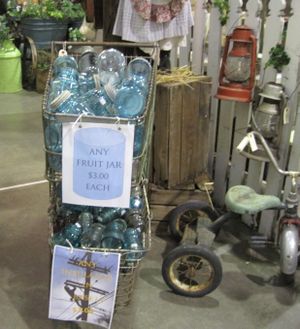 Antique canning jars in a vintage shopping basket at the 2010 Farm Chicks Show in Spokane. (Cheryl-Anne Millsap / Photo by Cheryl-Anne Millsap)