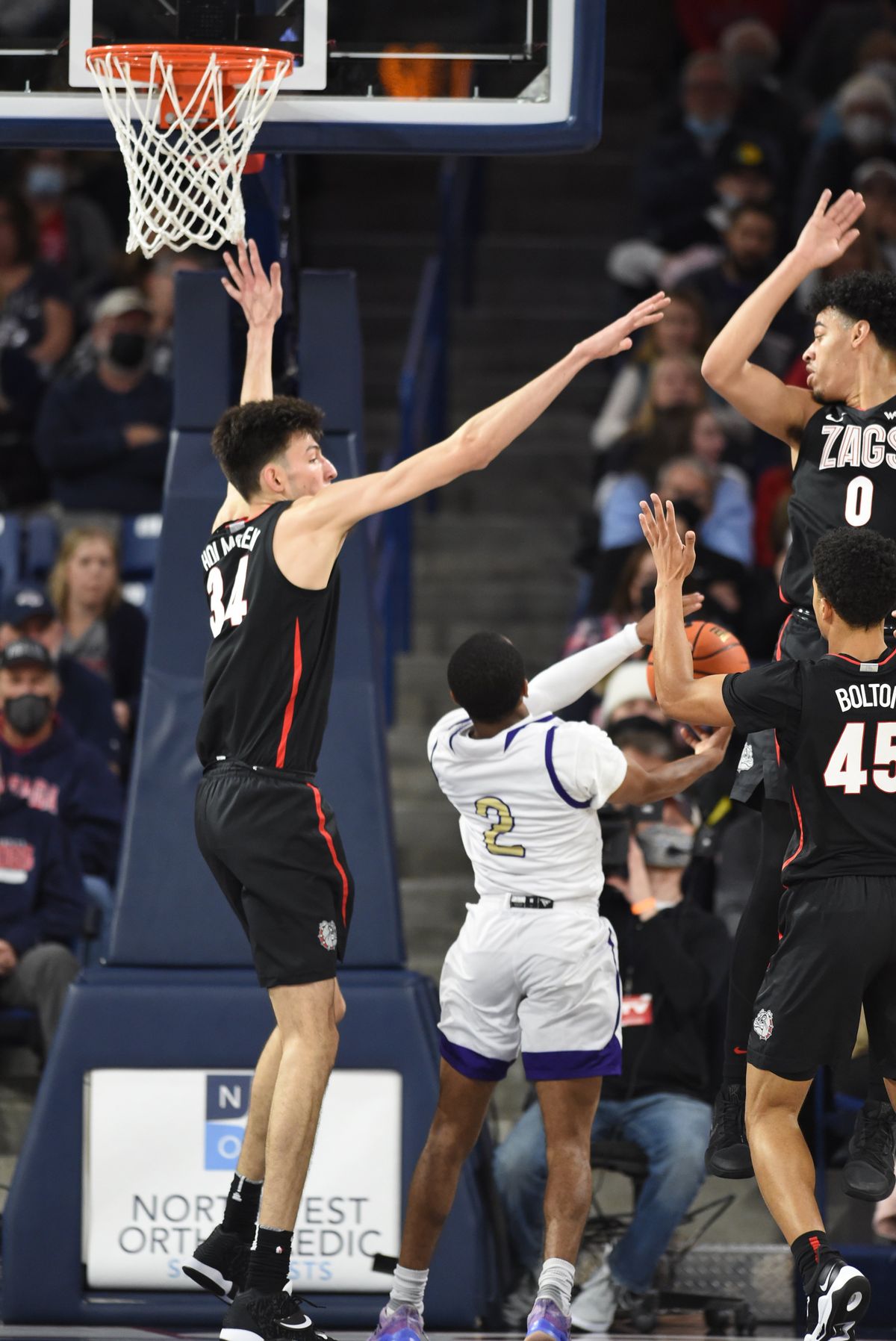 Alcorn State's Byron Joshua (2) looks for a way to the basket while surrounded by Gonzaga's Chet Holmgren, left, Julian Strawther (0) and Rasir Bolton (45) in the first half of the game Monday, Nov. 15, 2021 at McCarthey Athletic Center at Gonzaga University in Spokane, Washington.  (Jesse Tinsley/The Spokesman-Review)