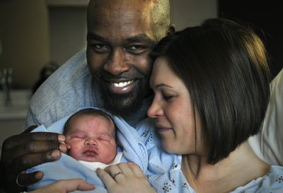 Tommy Williams Jr. and  Paula Williams welcomed Isaac Jabez-Obama Williams into the world Tuesday.   (Dan Pelle / The Spokesman-Review)