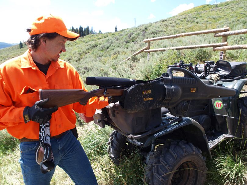 Hunters should safely store their guns on their ATVs before traveling.