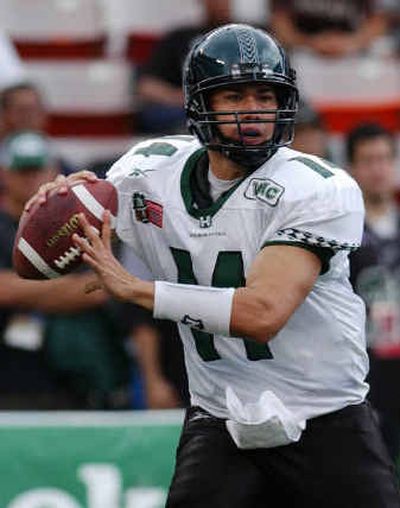 
Timmy Chang is college football's career leader in yards passing and total offense.
 (Associated Press / The Spokesman-Review)