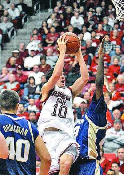 
Reserve guard Taylor Rochestie has overcome a knee injury to give WSU's offense a spark. 
 (Associated Press / The Spokesman-Review)