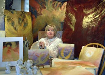 Painter Ellen Blasch has a knack for finding angels in her artwork. Page 12
(Dan Pelle / The Spokesman-Review)