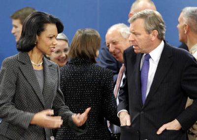 
Secretary of State Condoleezza Rice speaks with NATO Secretary-General Jaap de Hoop Scheffer during a meeting Thursday of NATO foreign ministers in Brussels. 
 (Associated Press / The Spokesman-Review)