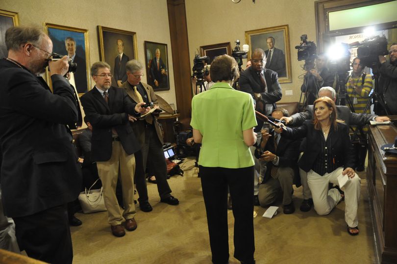 OLYMPIA -- Mary Alice Heuschel, Gov. Jay Inslee's chief of staff, explains the effects of a state shutdown next week to reporters. (Jim Camden)