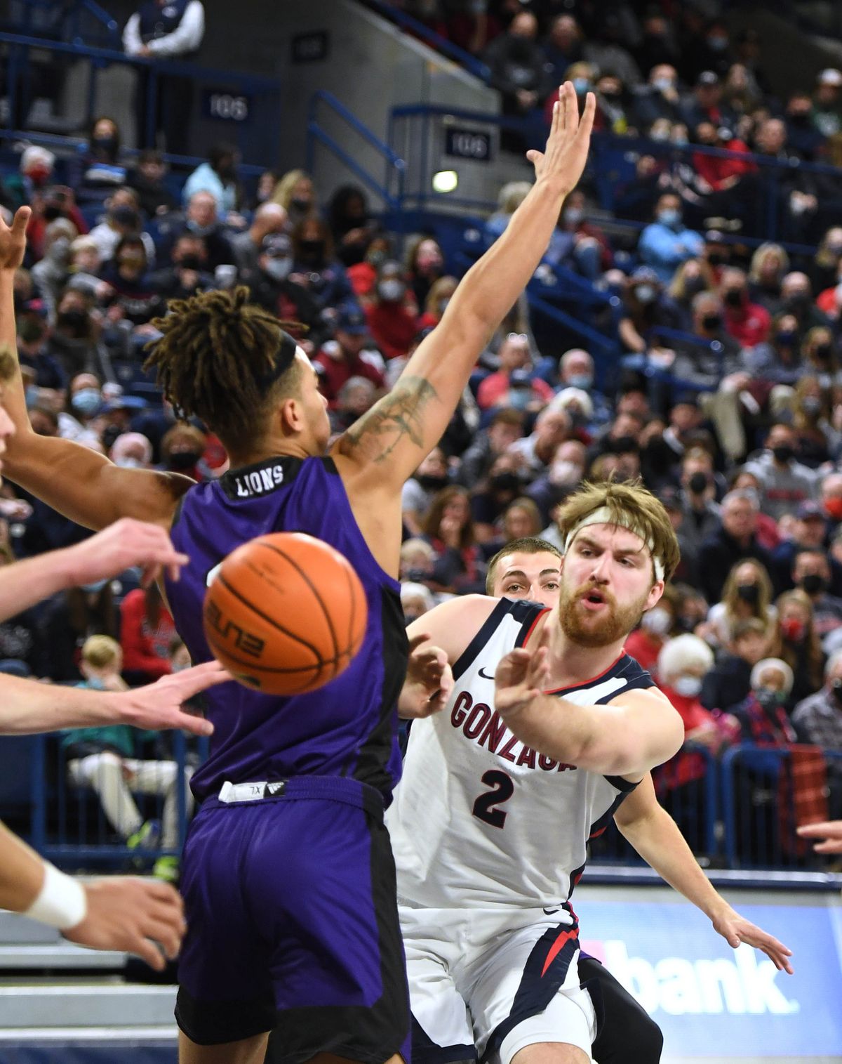 Gonzaga forward Drew Timme (2) makes a pass around North Alabama forward Damian Forrest (33) during a NCAA college basketball game, Tuesday, Dec. 28, 2021, in the McCarthey Athletic Center.  (COLIN MULVANY/THE SPOKESMAN-REVIEW)