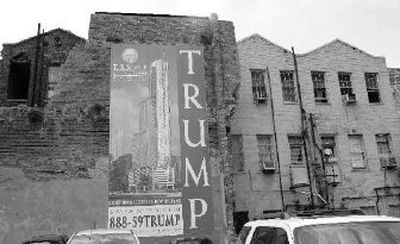 
A giant poster shows the proposed site where the Trump Tower is to be built in downtown New Orleans. The $400 million proposal by Donald Trump to construct the city's tallest building is going ahead, although no actual construction has begun. 
 (Associated Press / The Spokesman-Review)