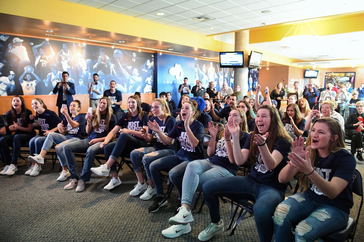 The Gonzaga women’s basketball team reacts Monday to finding out that they are a 13 seed that will play 4th seed Stanford in the NCAA tournament. (Colin Mulvany / The Spokesman-Review)