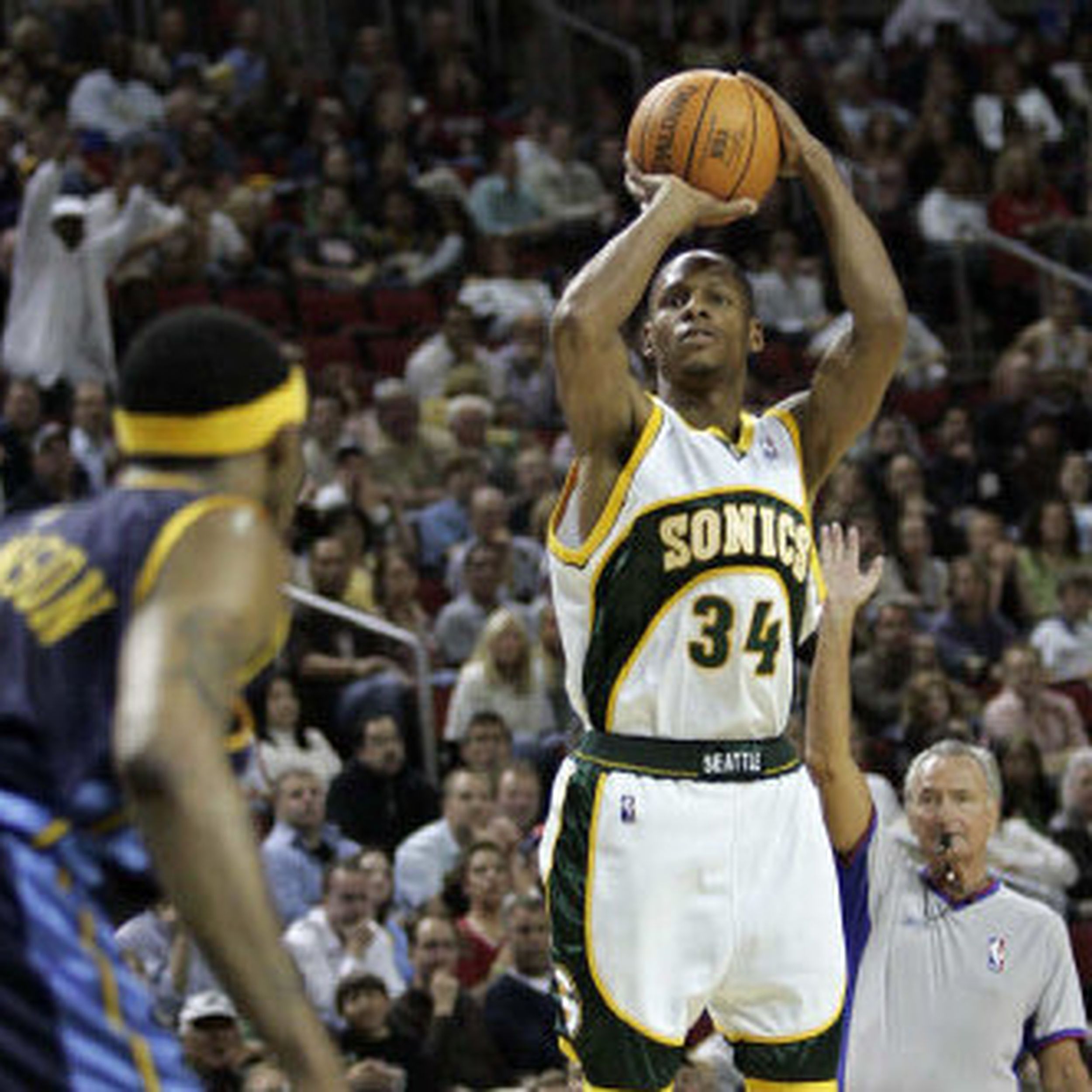 Seattle SuperSonics' Ray Allen celebrates after making his 268th 3-point  basket of the season against the Denver Nuggets, to set a new NBA record in  the first half of a basketball game