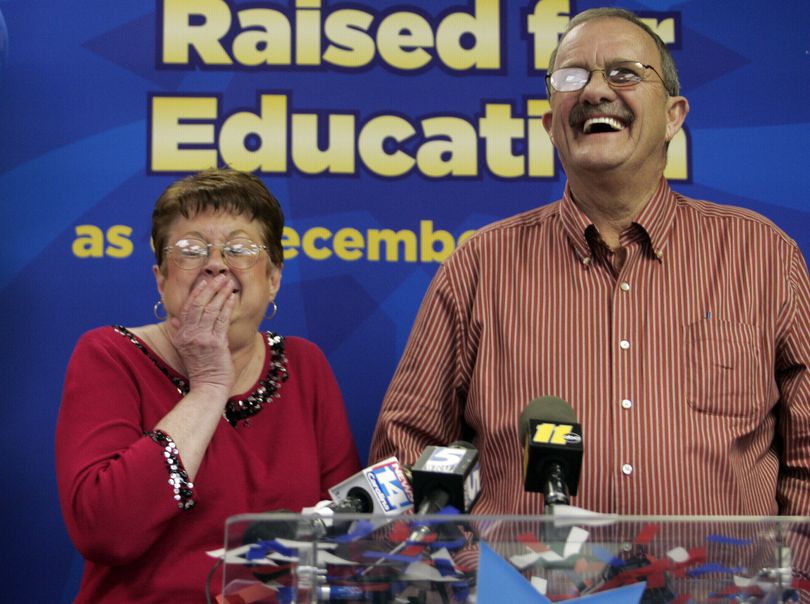 Frank Griffin and his wife Loretta of Asheville, N.C., laugh during a news conference in Raleigh, N.C., Monday, Feb. 8, 2010 after claiming their Powerball jackpot winnings of $141 million. (Jim Bounds / Fr3003 Ap)