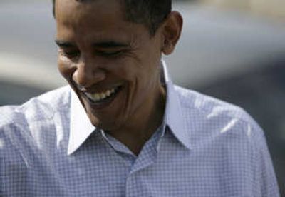 
Sen. Barack Obama campaigns door-to-door in Philadelphia  on Saturday.
 (The Spokesman-Review)