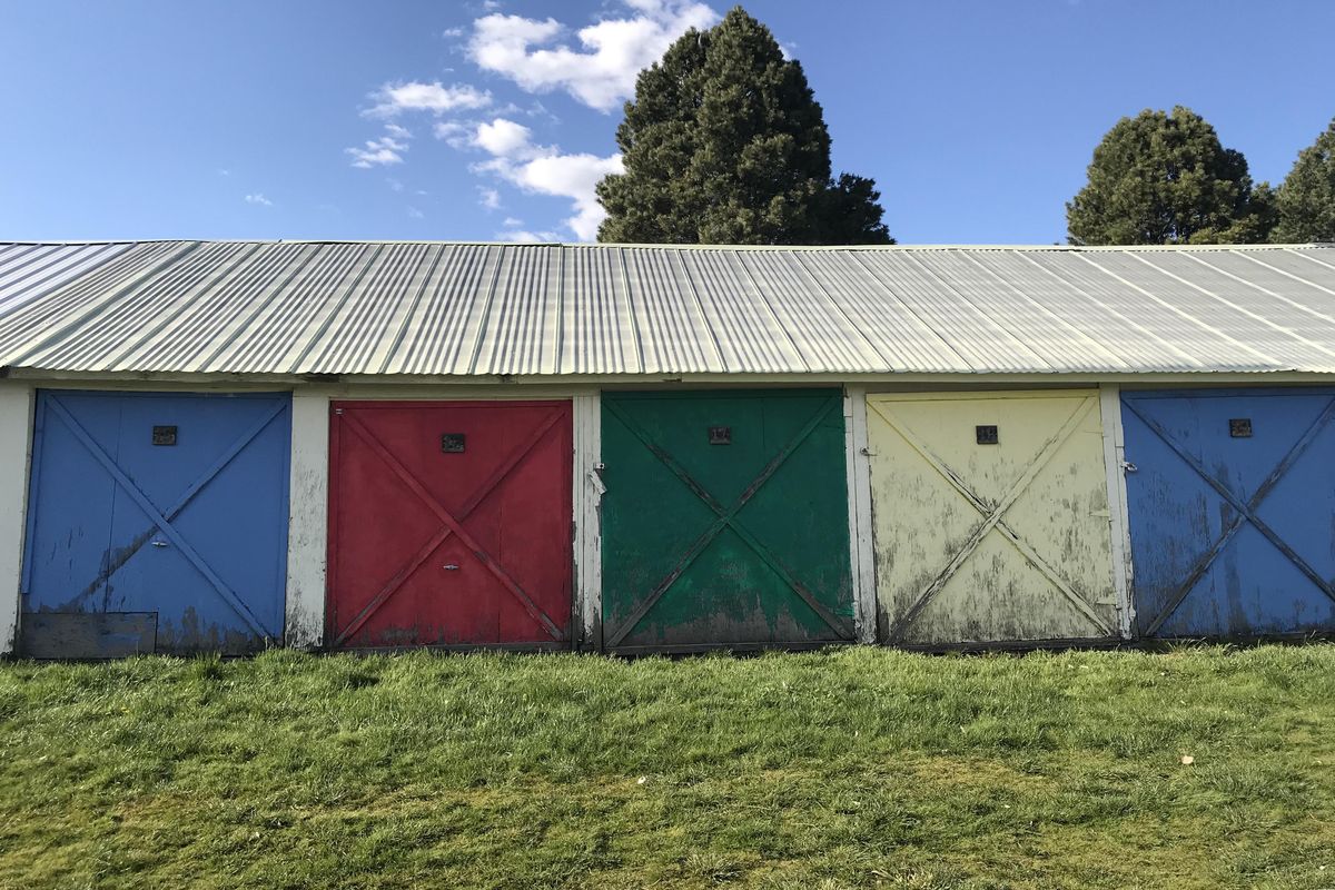 The cart barn at the Tekoa Golf Club pops with color. (Madison McCord / The Spokesman-Review)