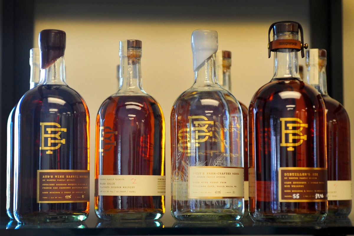 Bottles of whiskey and other spirits line the shelves at Browne Family Spirits tasting room at 714 N. Lee St.  (Christopher Anderson/For The Spokesman-Review)