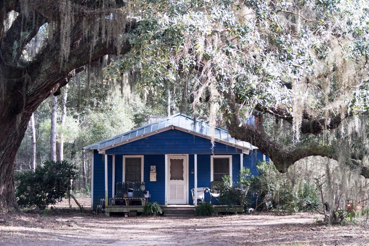 A traditional Gullah home on Daufuskie Island, S.C., is painted “haint blue.” “Haint” is the Gullah pronunciation of “haunt.” The color is meant to keep evil spirits away. (Dina Mishev / For The Washington Post)