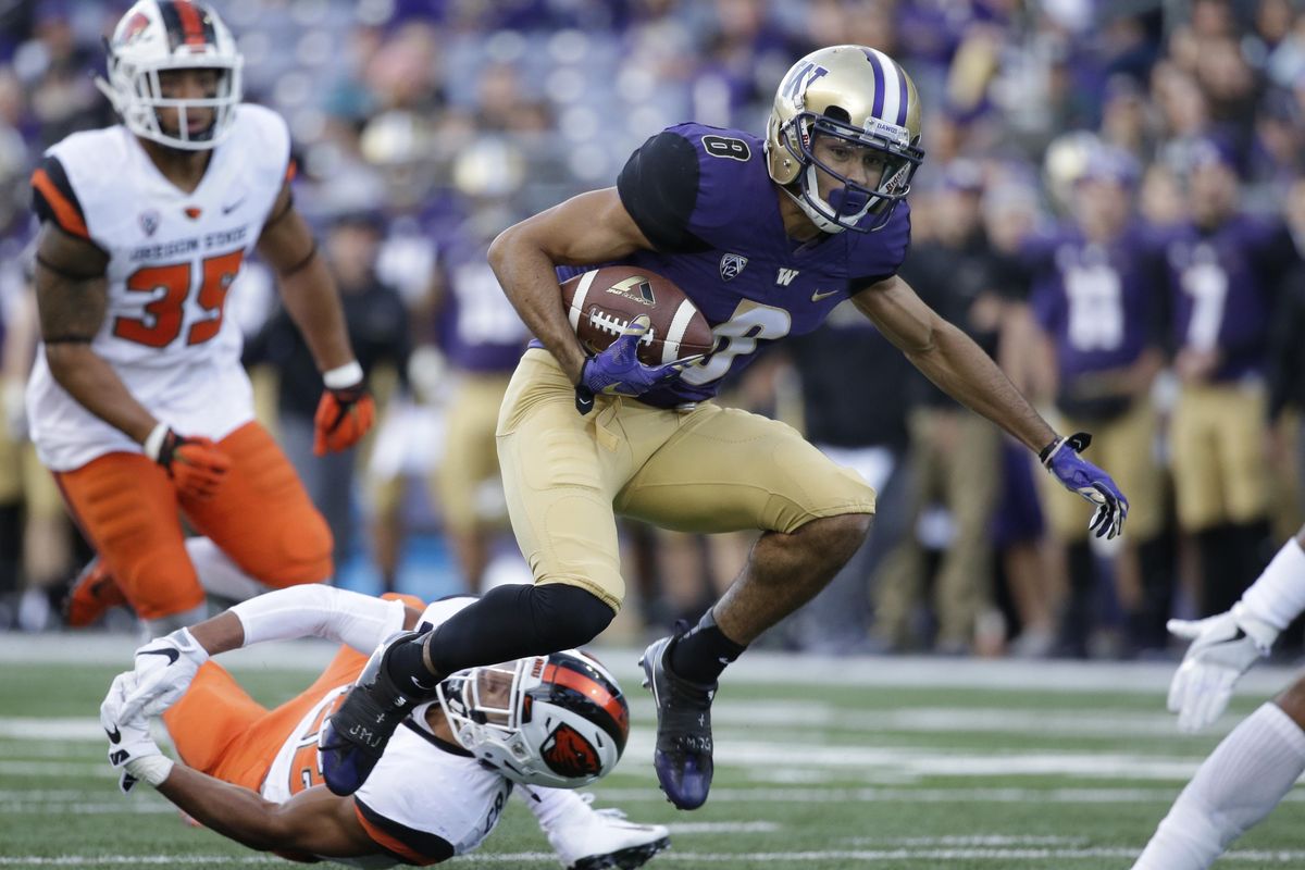 This Oct. 22, 2016 file photo shows Washington’s Dante Pettis in action against Oregon State in an NCAA college football game in Seattle. Throughout his first two years at Washington, Pettis was regularly regarded as having the potential to be great. At times that potential would emerge and the Huskies would be teased by what Pettis might become. (Elaine Thompson / Associated Press)