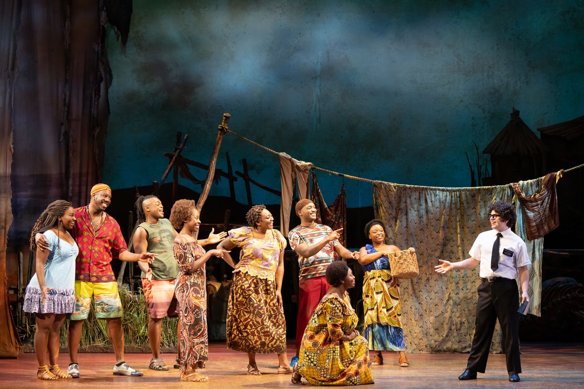 The touring Broadway cast of “The Book of Mormon” looks on to Diego Enrico, right. (Courtesy of Julieta Cervantes)