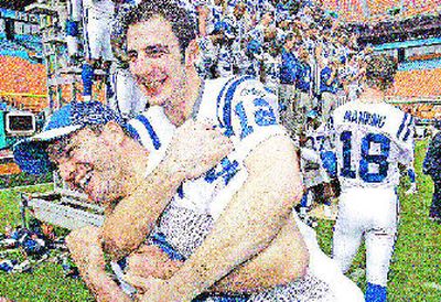 
Jim Sorgi (12), wrestling with Adam Vintieri, knows his place behind Peyton Manning. 
 (Associated Press / The Spokesman-Review)