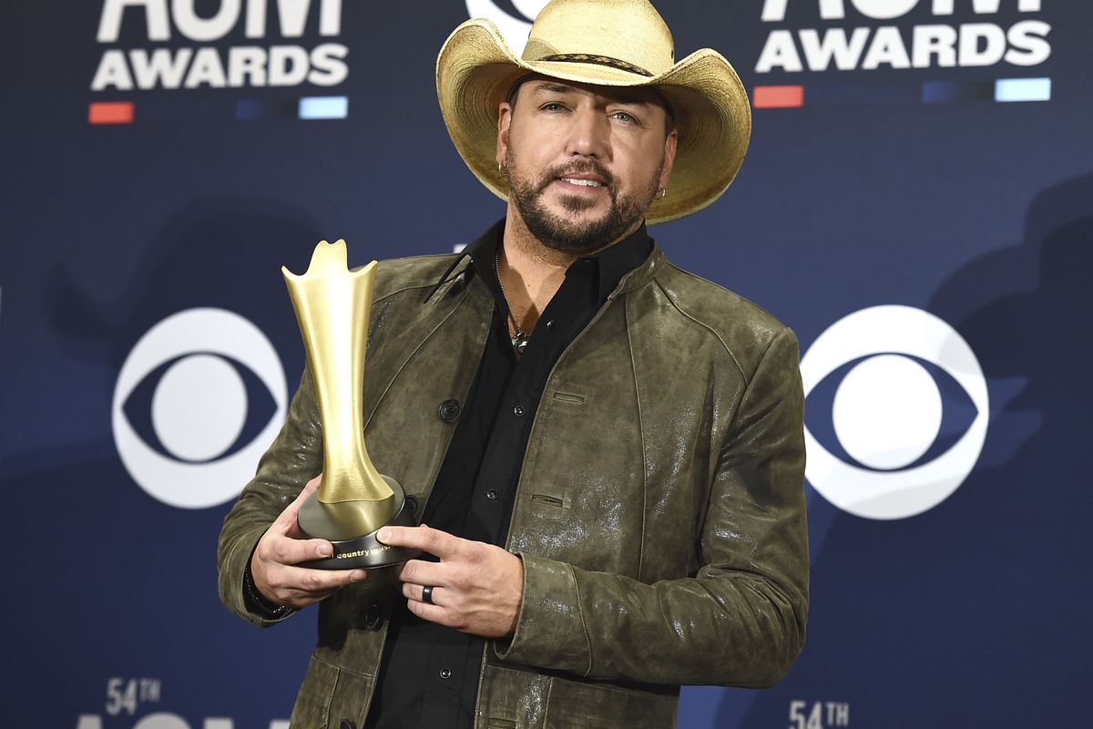 Jason Aldean stands in the media room with the Dick Clark Artist of the Decade Award at the 54th Annual Academy of Country Music Awards at MGM Grand Garden Arena on Sunday, April 7, 2019, in Las Vegas.  (Jordan Strauss/Invision/AP)