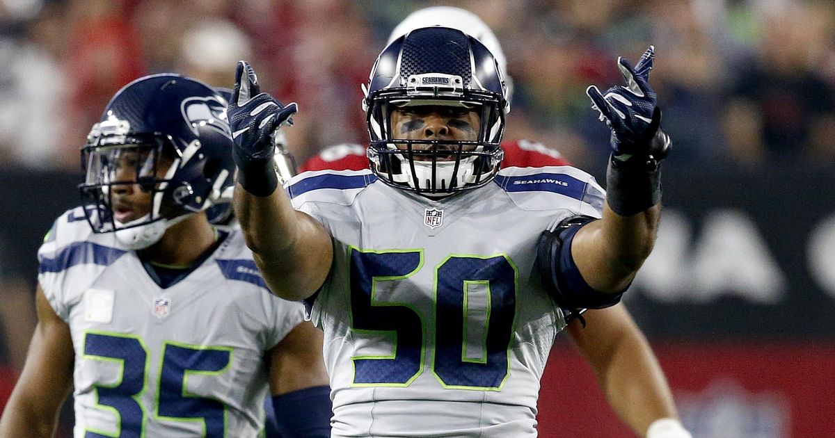 K.J. Wright has knee surgery, status for Seattle's opener unknown