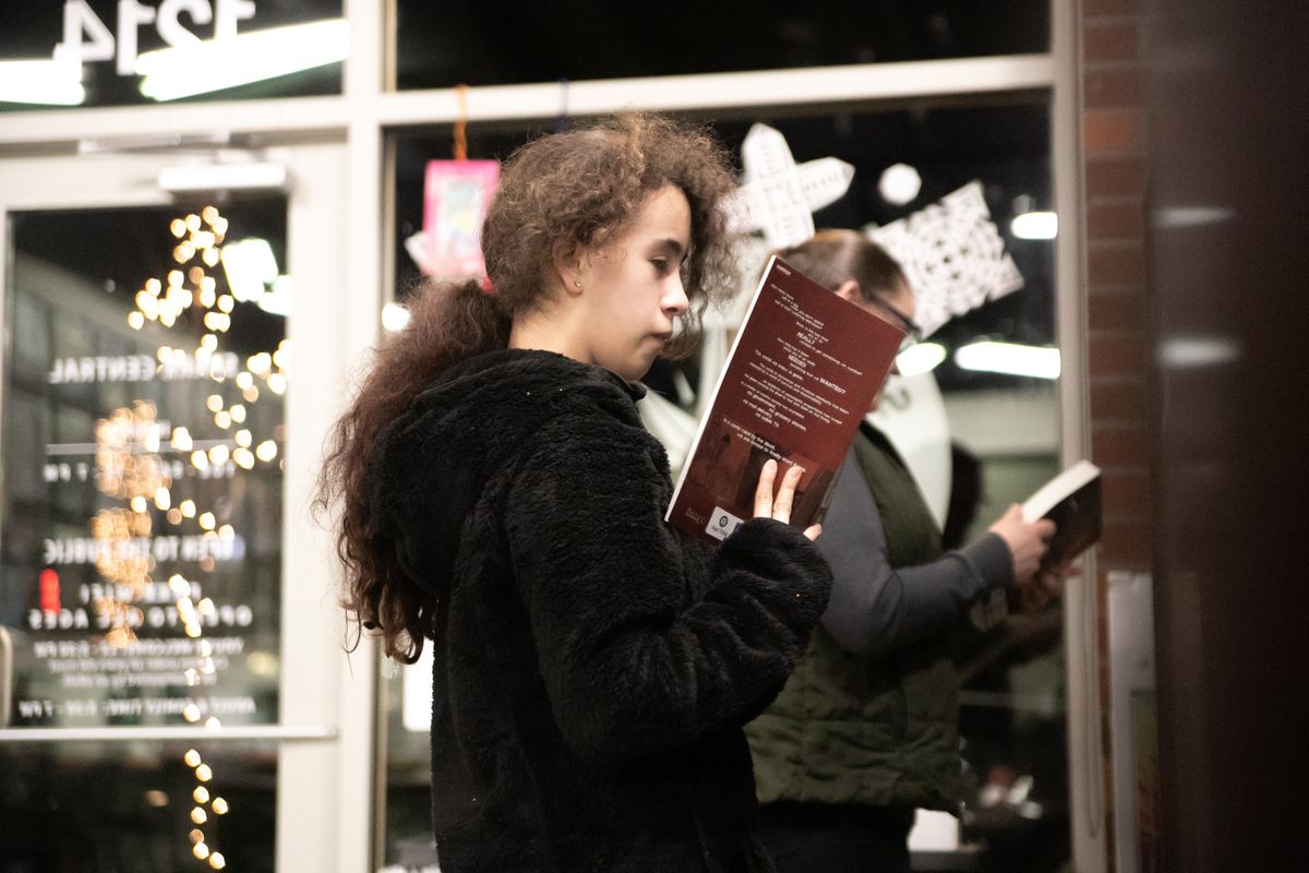 Victoria Gonzales, 12, selects a graphic novel from the shelves while mom Shari Rutherford looks for a book as well during a Drop In and Draw session on Jan. 29, 2020, at Spark Central.  (Libby Kamrowski/The Spokesman-Review)