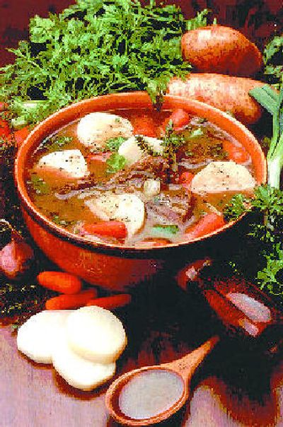 
Carrots, potatoes and boneless blade steaks are slow cooked for fork tenderness for a hearty Irish stew. 
 (Associated Press / The Spokesman-Review)