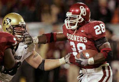 
OU's Adrian Peterson rushed for 172 yards. 
 (Associated Press / The Spokesman-Review)