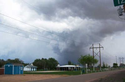 
A funnel cloud is seen near Gilcrest, Colo., as it moves northwest pass Windsor on Thursday.Associated Press
 (Associated Press / The Spokesman-Review)