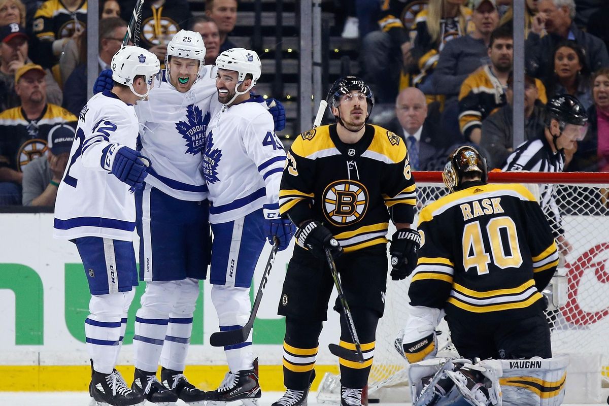 Toronto Maple Leafs‘ James van Riemsdyk (25) celebrates his goal against Boston Bruins’ Tuukka Rask (40), of Finland, with teammates Tyler Bozak (42) and Nazem Kadri (43) during the second period of Game 5 of an NHL hockey first-round playoff series in Boston, Saturday, April 21, 2018. (Michael Dwyer / Associated Press)