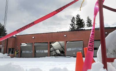 
Tape and cones mark the danger area at Fire District 8 Station 82 in Valleyford on Thursday.  Heavy snow has caused several roofs to collapse throughout the region. 
 (Christopher Anderson / The Spokesman-Review)