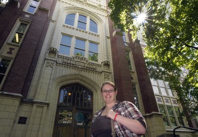 Graduating senior Amanda Sackett of Lewis and Clark High School poses outside the school  May 20. chrisa@spokesman.com (Christopher Anderson chrisa@spokesman.com / The Spokesman-Review)