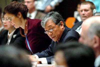 
Lee Jong-Wook, center, director general of the World Health Organization, speaks Monday on the first day of a global meeting in Geneva, Switzerland, to develop a common approach to fighting bird flu. 
 (Associated Press / The Spokesman-Review)