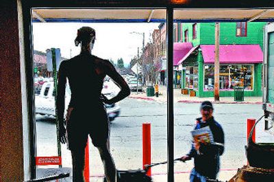 
A person walks past Athlete's Choice in Sandpoint on Tuesday. Ray and Cindy Smith bought the store in 2005. 
 (Photos by Kathy Plonka / The Spokesman-Review)