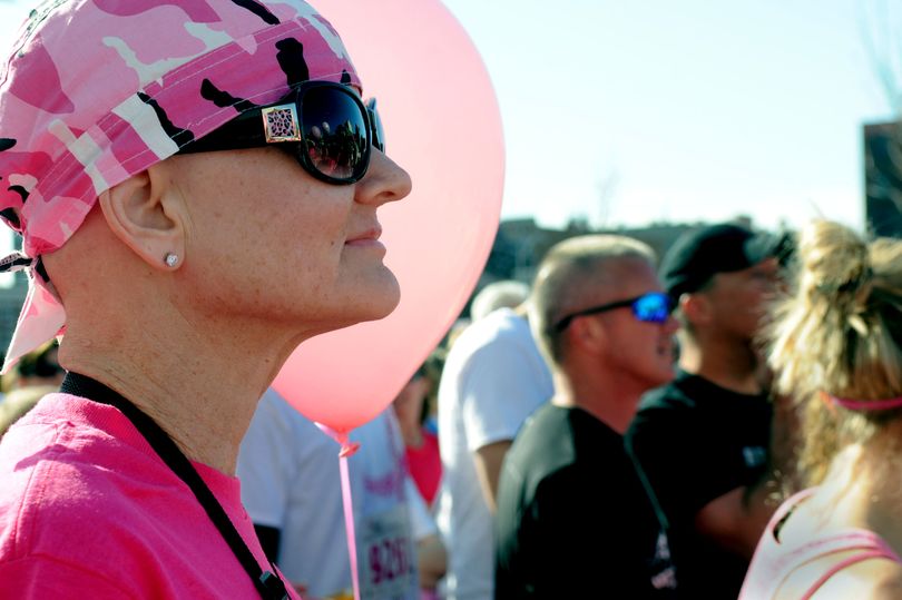 On her mark: Spokane resident Jackie Colton lines up for the start of the Susan G. Komen Eastern Washington Race for the Cure in downtown Spokane on Sunday morning. Colton, who has been battling breast cancer for five months, was among an estimated 7,500 participants in the seventh annual fundraiser to fight breast cancer. See story on A6 and more photos at spokesman.com/photos. (Kathy Plonka)