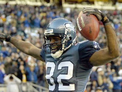 
Darrell Jackson, now with San Francisco, celebrated 47 touchdowns with the Seahawks.   Associated Press
 (Associated Press / The Spokesman-Review)