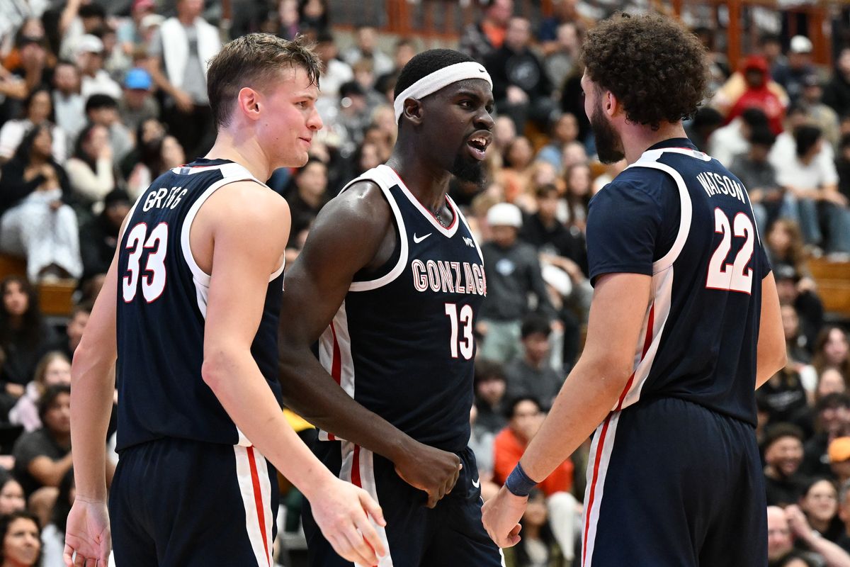 Gonzaga forward Graham Ike, center, celebrates with teammates Ben Gregg, left, and Anton Watson after scoring against Pacific on Saturday at the Alex G. Spanos Center in Stockton, Calif.  (Tyler Tjomsland/The Spokesman-Review)
