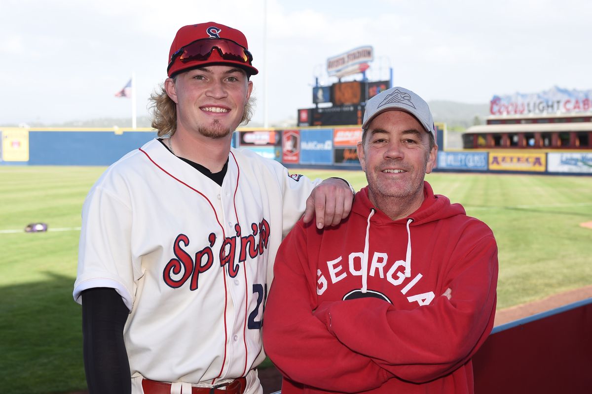 Spokane Indians infielder Aaron Schunk, left, poses with his father, Eric, before a game this season at Avista Stadium.  (James Snook/Foe The Spokesman-Review)