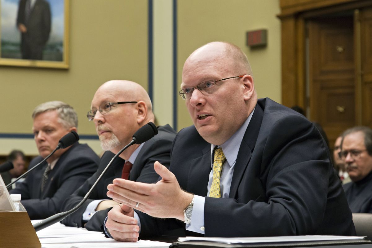 Former State Department officers Eric Nordstrom, right, and Gregory Hicks, center, and State Department counterterrorism official Mark Thompson, left, testify on Capitol Hill on Wednesday. (Associated Press)