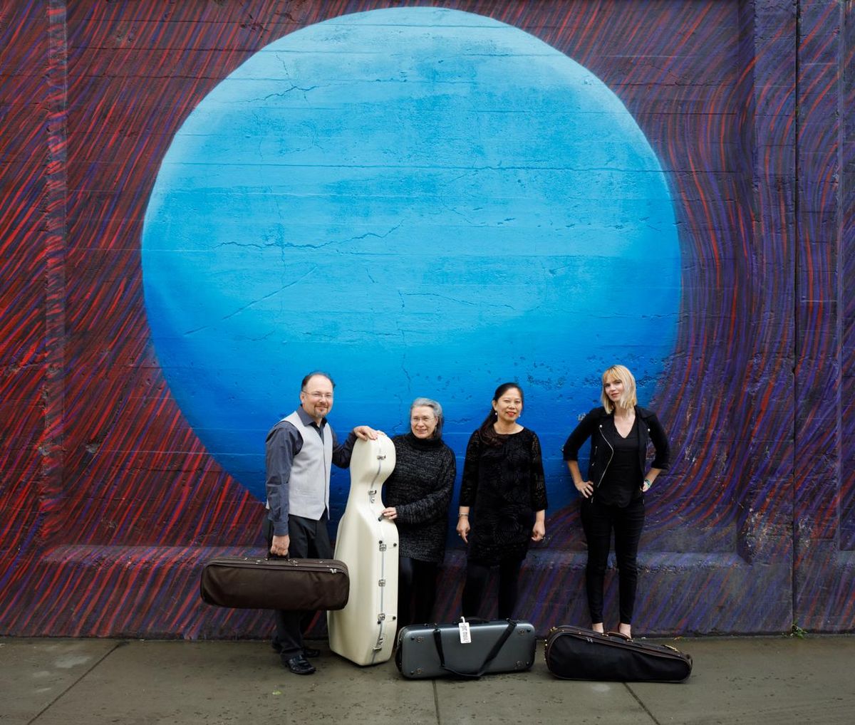 The Spokane String Quartet features Mateusz Wolski, Helen Byrne, Jeannette Wee-Yang and Amanda Howard-Phillips. (Chip Phillips)