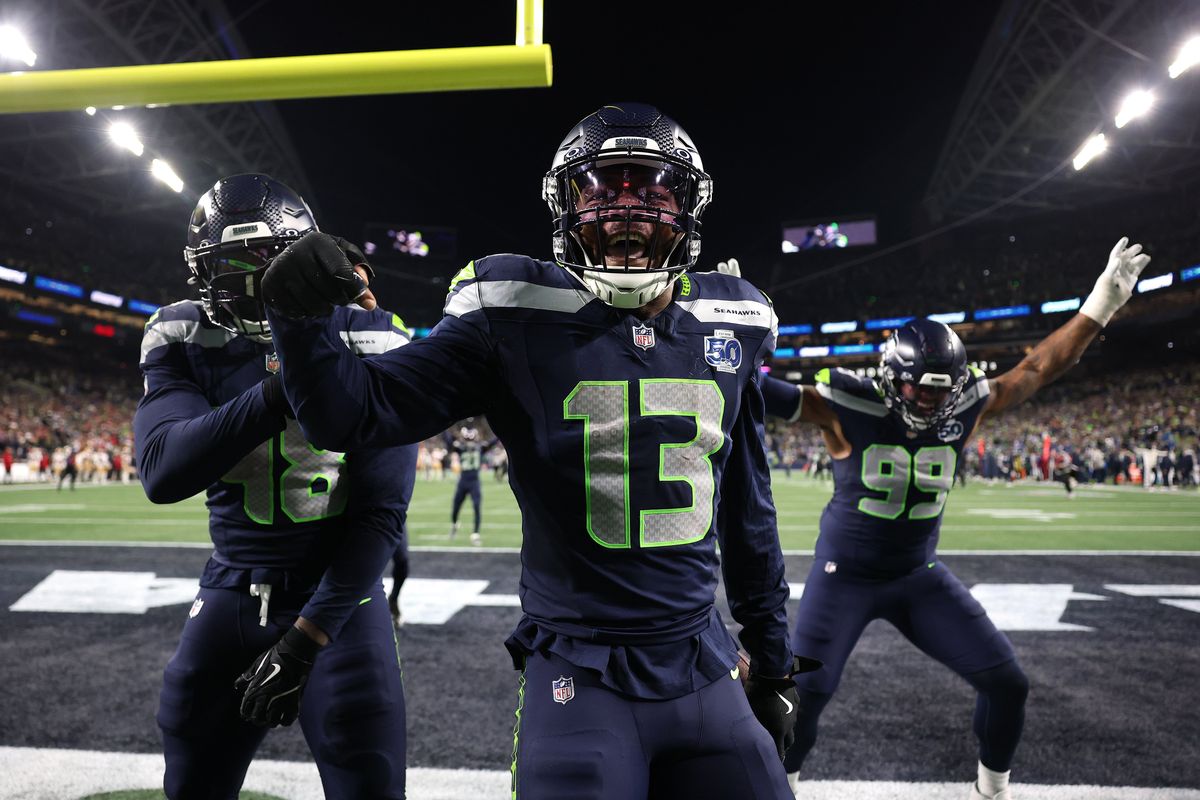 Seahawks linebacker Ernest Jones IV celebrates an interception against the 49ers this season at Lumen Field in Seattle. (Getty Images)