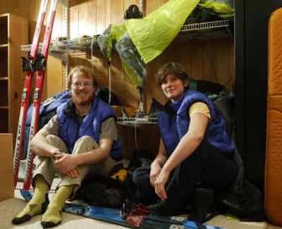 Anchorage Daily News Husband-wife team Erin McKittrick, left, and Bretwood Higman take a rare indoor break during a stop in Anchorage this winter.
(Anchorage Daily News / The Spokesman-Review)