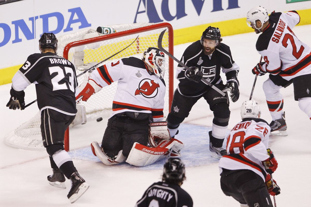 Dustin Brown with the Stanley Cup Trophy after Winning Game 6 of the 2012  Stanley Cup Finals Sports Photo