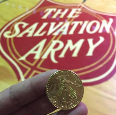 Someone dropped a 1-ounce solid gold coin into one of the Salvation Army’s red collection kettles in Spokane, the charity said in a news release Friday. (Courtesy of the Salvation Army)