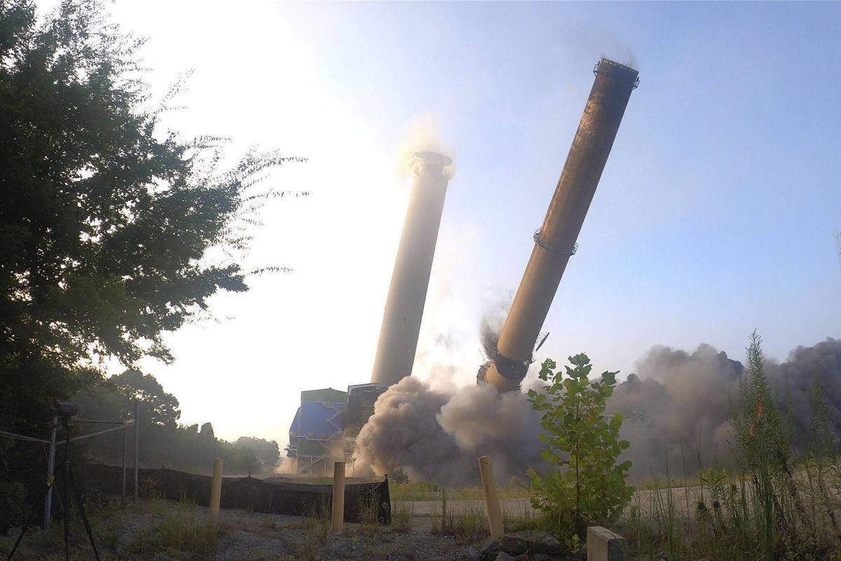 The idled Colbert Fossil Plant at Tuscumbia, Ala is imploded on Aug. 25. The federal utility is phasing out coal-fired electric generators in favor of cleaner energy alternatives.  (HONS)