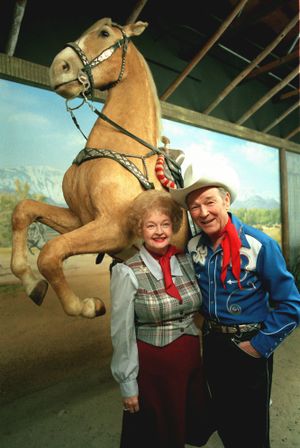 FILE - In this Feb. 15, 1984 file photo, Roy Rogers is shown with his wife Dale Evans before the stuffed remains of Trigger, Roy's horse, at the Roy Rogers museum in Victorville, Calif. An upcoming New York auction will feature Rogers belongings including the preserved remains of his famous horse, Trigger. The presale estimate for the dead horse is $100,000 to $200,000. (Lennox Mclendon / Associated Press)
