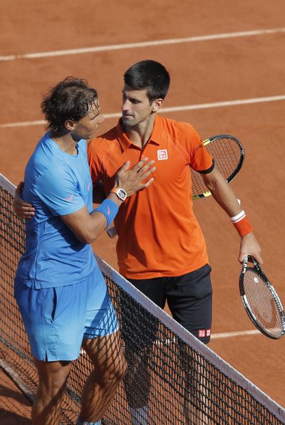 Novak Djokovic, right, handed Rafael Nadal his second career defeat at Roland Garros. (Associated Press)