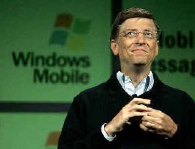
Bill Gates of Microsoft acknowledges the audience after delivering the keynote address to the Mobile and Embedded DevCon (MEDC) conference Tuesday.  
 (Associated Press / The Spokesman-Review)
